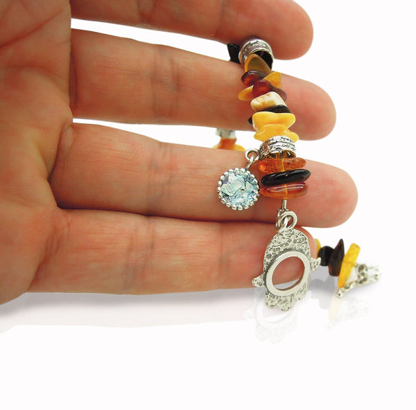 Bracelet - Amber Bracelet With A Hamsa Hand Closer And Flower Shapes