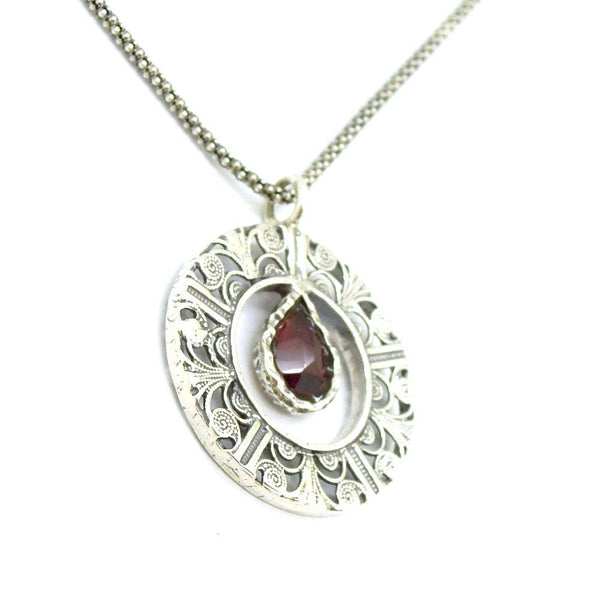 Pendant - Drop Shaped Garnet In A Round Filigree Silver Pendant