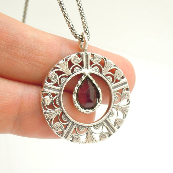 Pendant - Drop Shaped Garnet In A Round Filigree Silver Pendant
